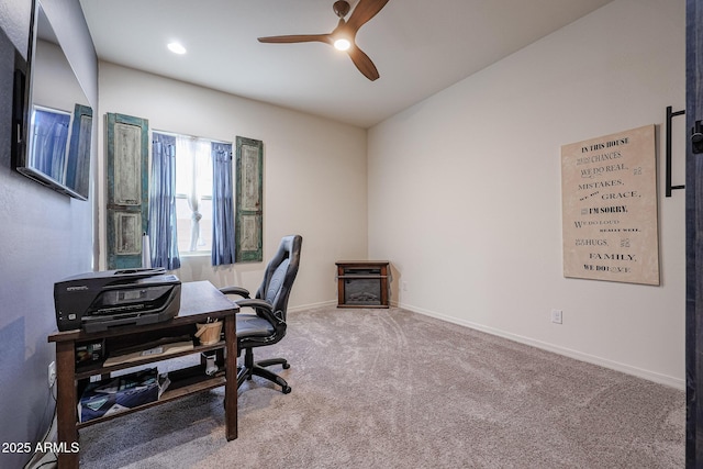 office featuring ceiling fan and carpet