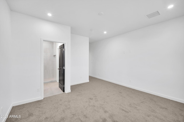 22548 W Huntington Dr, Buckeye, AZ 85326 - unfurnished bedroom featuring carpet, recessed lighting, baseboards, and connected bathroom