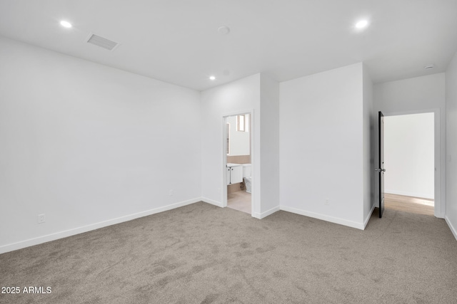 22548 W Huntington Dr, Buckeye, AZ 85326 - unfurnished bedroom featuring carpet, baseboards, recessed lighting, and ensuite bath