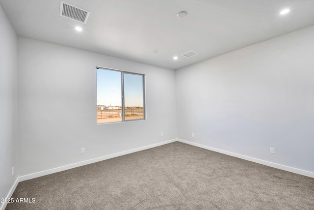 22548 W Huntington Dr, Buckeye, AZ 85326 - unfurnished room with carpet, baseboards, and recessed lighting