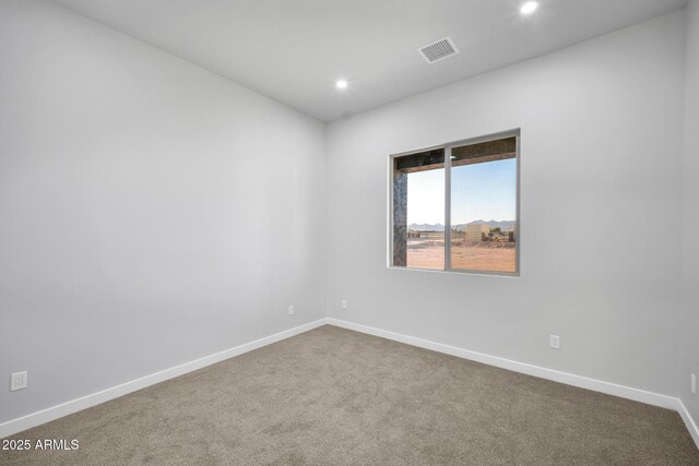 22548 W Huntington Dr, Buckeye, AZ 85326 - spare room with dark carpet, recessed lighting, and baseboards