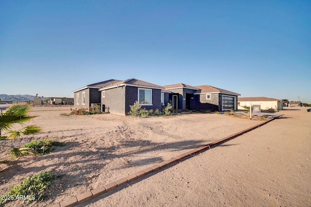 22548 W Huntington Dr, Buckeye, AZ 85326 - view of front of house with stucco siding