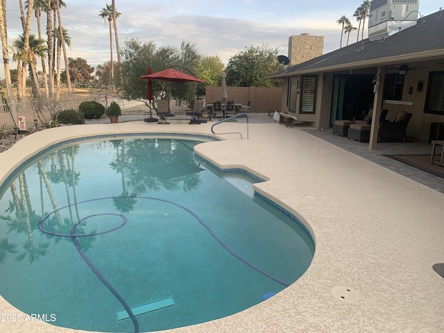 view of pool with a patio area, a fenced backyard, an outdoor hangout area, and a fenced in pool