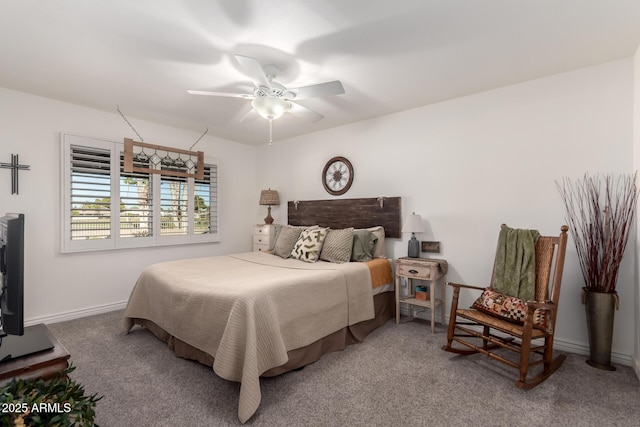 bedroom featuring carpet flooring, a ceiling fan, and baseboards