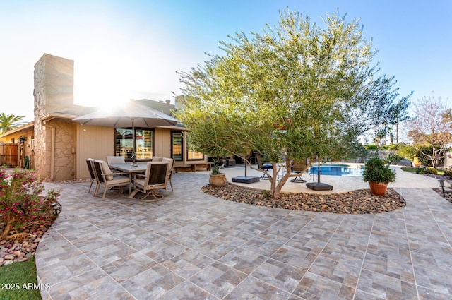 view of patio with an outdoor pool