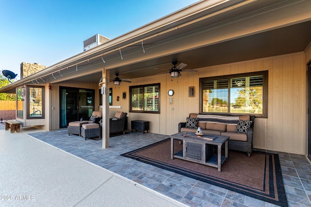 view of patio / terrace featuring central AC unit, an outdoor hangout area, and a ceiling fan