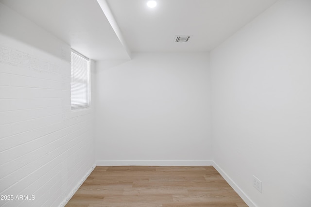 spare room featuring light wood-type flooring