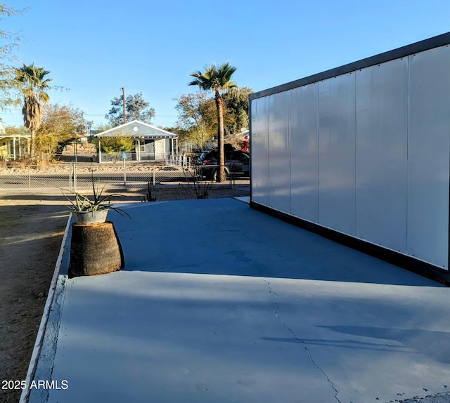 view of side of property with fence