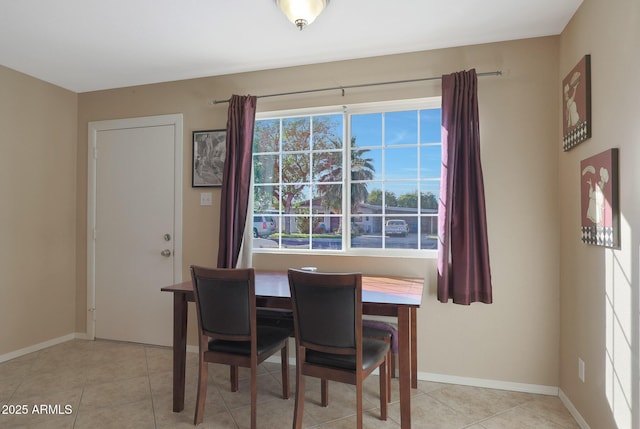 dining room featuring light tile patterned floors