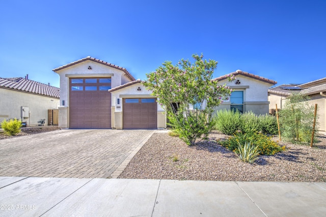 12806 W Mclellan Rd, Glendale, AZ 85307 - mediterranean / spanish house with stucco siding, a tiled roof, driveway, and a garage