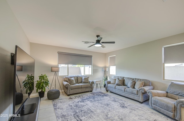 12806 W Mclellan Rd, Glendale, AZ 85307 - living area with ceiling fan and light wood-type flooring
