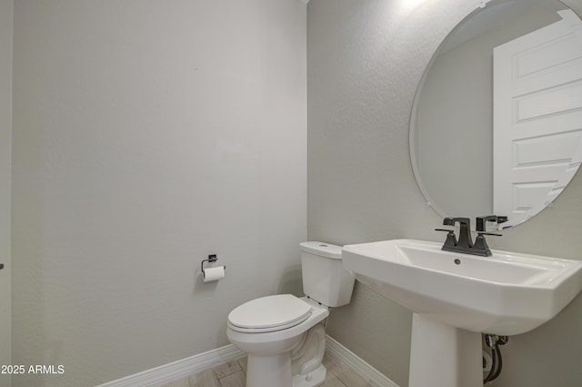 12806 W Mclellan Rd, Glendale, AZ 85307 - half bath featuring toilet and baseboards