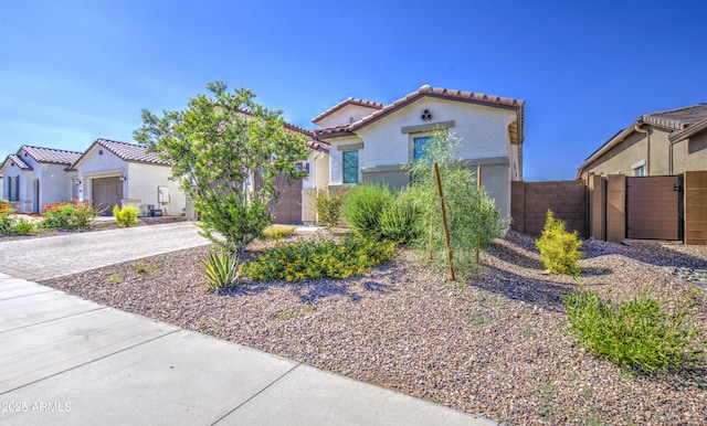 12806 W Mclellan Rd, Glendale, AZ 85307 - mediterranean / spanish-style home featuring a tile roof, stucco siding, driveway, and an attached garage