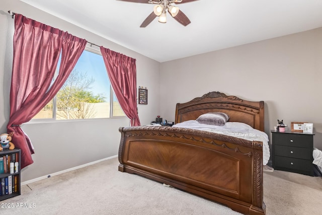 bedroom with light colored carpet and ceiling fan