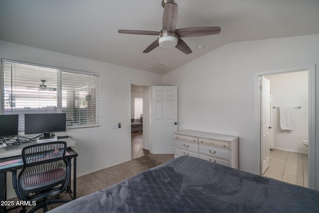 bedroom with visible vents, a ceiling fan, baseboards, ensuite bathroom, and vaulted ceiling