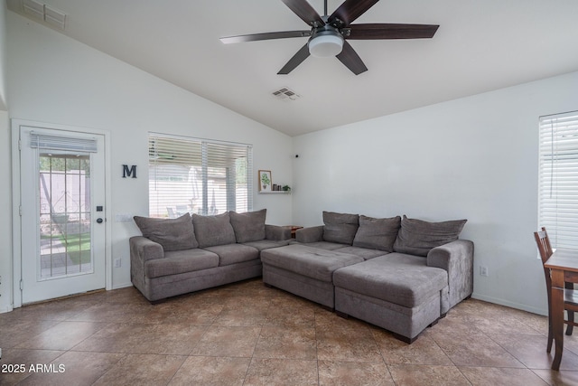 living room with visible vents, plenty of natural light, and ceiling fan
