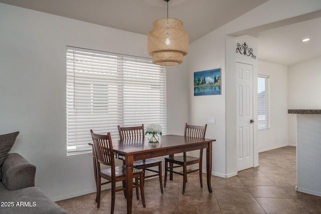 dining room featuring baseboards, recessed lighting, and tile patterned floors