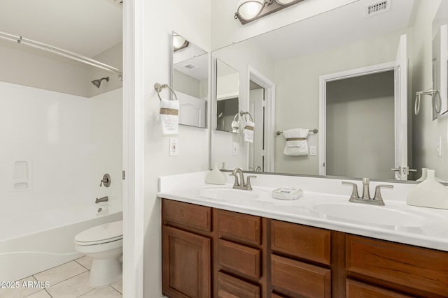 full bathroom featuring tile patterned flooring, visible vents, a sink, and toilet