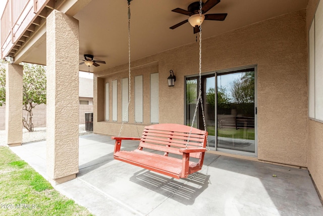 view of patio / terrace featuring a ceiling fan