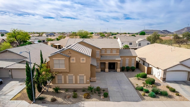 birds eye view of property featuring a residential view and a mountain view