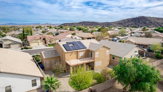 birds eye view of property featuring a residential view and a mountain view