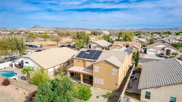 bird's eye view with a residential view and a mountain view