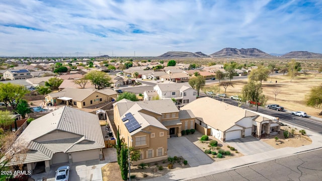 birds eye view of property with a residential view and a mountain view