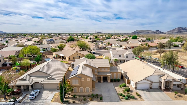 bird's eye view featuring a residential view and a mountain view