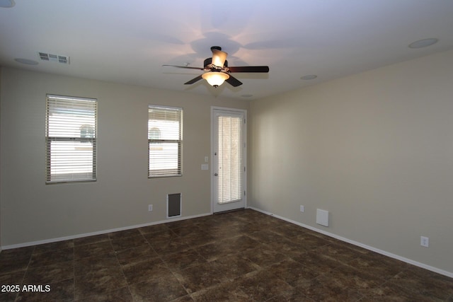 spare room featuring ceiling fan