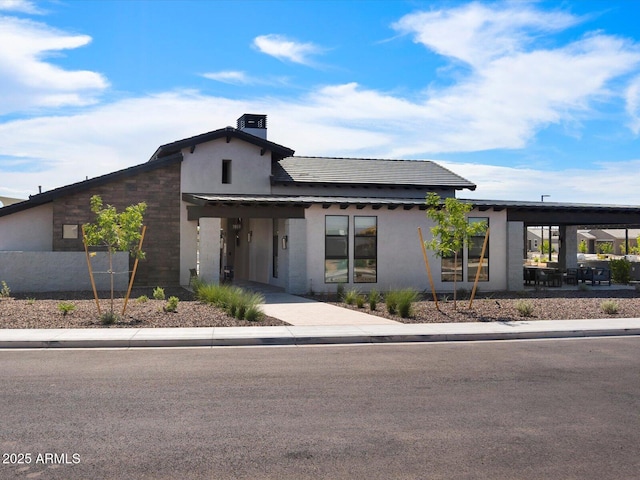 view of front of property featuring stucco siding