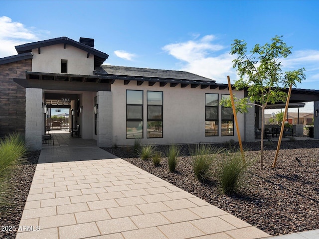 exterior space featuring stucco siding