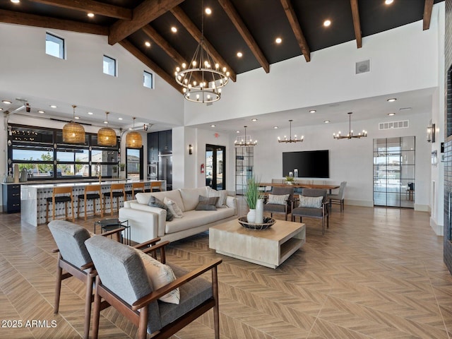 living room featuring high vaulted ceiling, visible vents, a notable chandelier, and beamed ceiling