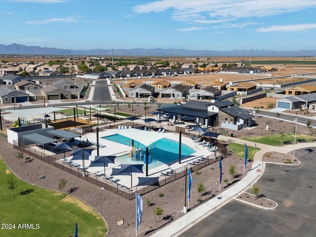 birds eye view of property with a residential view and a mountain view