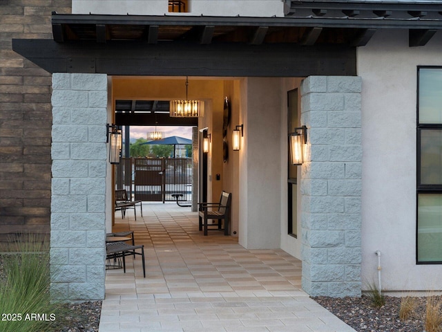 property entrance featuring concrete block siding