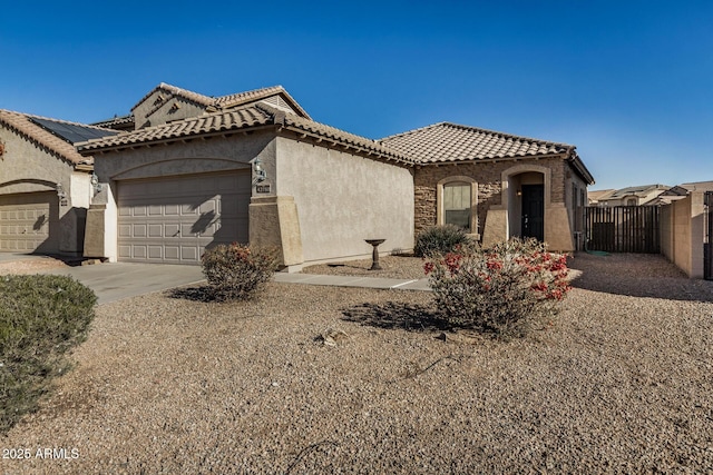 view of front of home with a garage