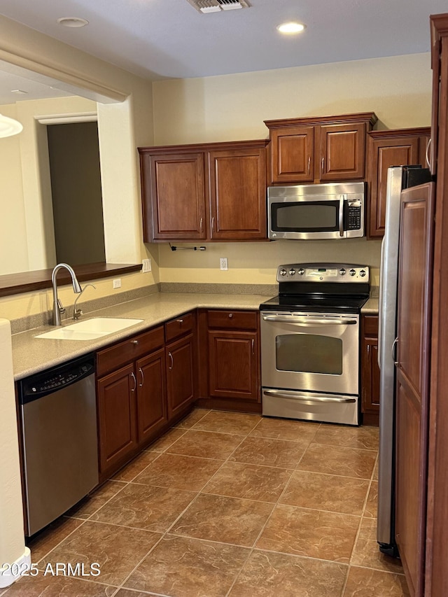 kitchen with stainless steel appliances and sink