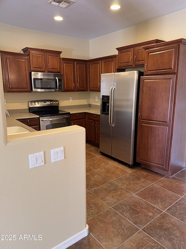 kitchen with sink and stainless steel appliances