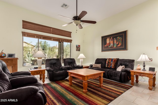 tiled living room with ceiling fan and visible vents