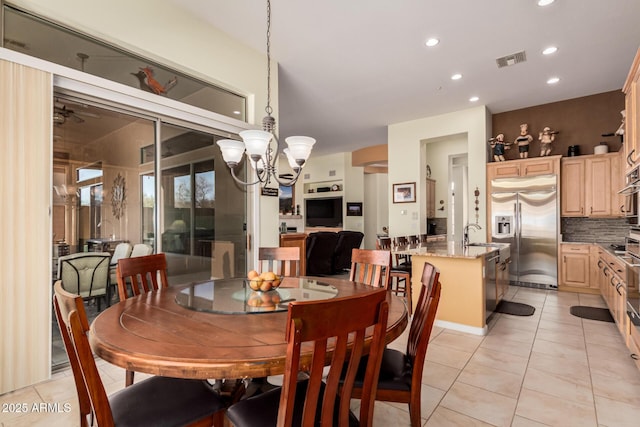 dining room featuring recessed lighting, visible vents, an inviting chandelier, and light tile patterned flooring