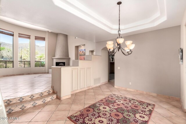 10657 E Cloudview Ave, Gold Canyon, AZ 85118 - interior space with visible vents, baseboards, light tile patterned floors, and a chandelier