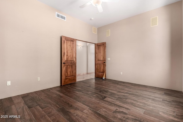 10657 E Cloudview Ave, Gold Canyon, AZ 85118 - unfurnished bedroom with visible vents, a ceiling fan, and wood finished floors