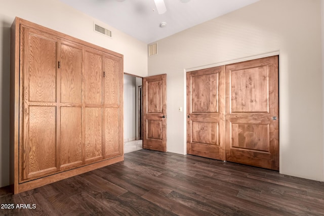 10657 E Cloudview Ave, Gold Canyon, AZ 85118 - unfurnished bedroom with visible vents, a ceiling fan, and dark wood-style floors