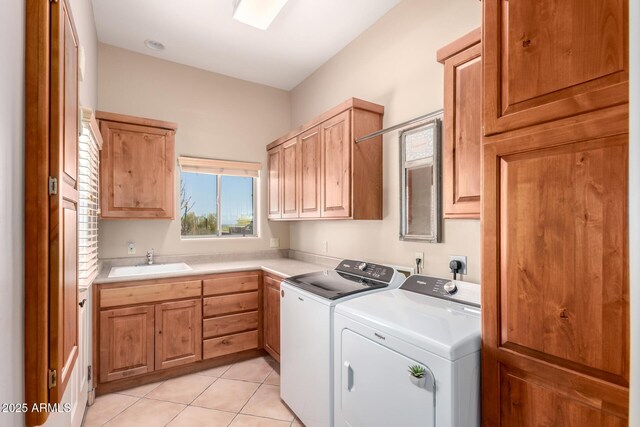10657 E Cloudview Ave, Gold Canyon, AZ 85118 - clothes washing area with a sink, light tile patterned floors, cabinet space, and washer and dryer