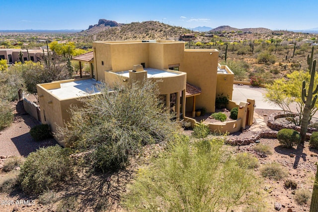 10657 E Cloudview Ave, Gold Canyon, AZ 85118 - view of home's exterior featuring a mountain view and stucco siding
