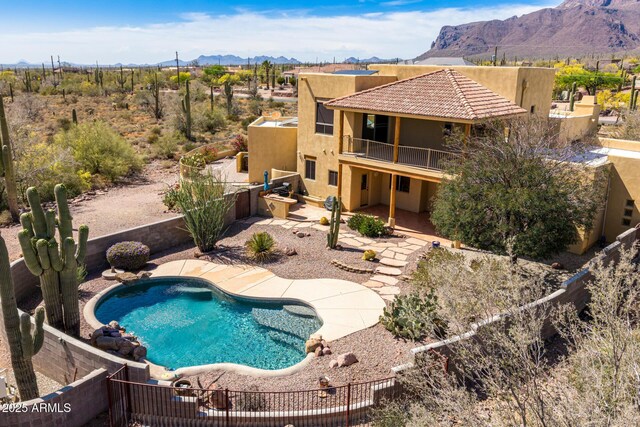 10657 E Cloudview Ave, Gold Canyon, AZ 85118 - view of pool with a patio, a fenced in pool, a mountain view, and a fenced backyard