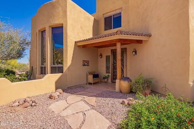 10657 E Cloudview Ave, Gold Canyon, AZ 85118 - back of property featuring a patio, stucco siding, and a tiled roof