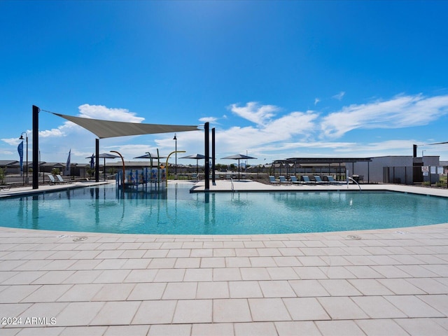 view of swimming pool featuring a patio