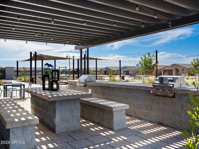 view of patio featuring area for grilling and grilling area