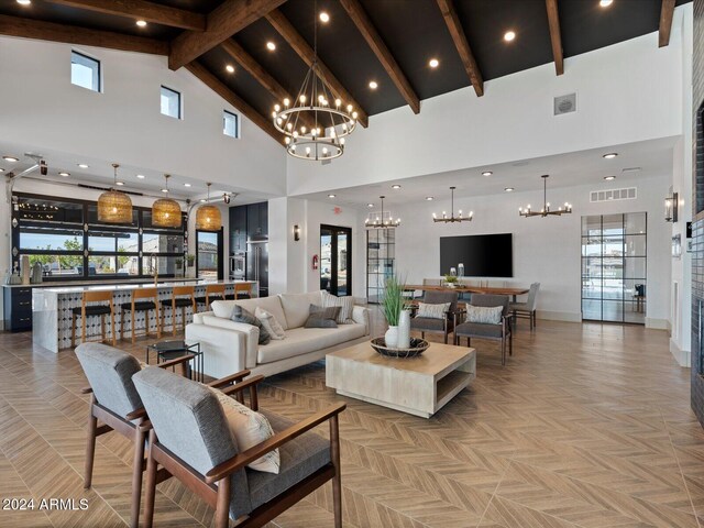 living room with beamed ceiling, a wealth of natural light, high vaulted ceiling, and light parquet floors