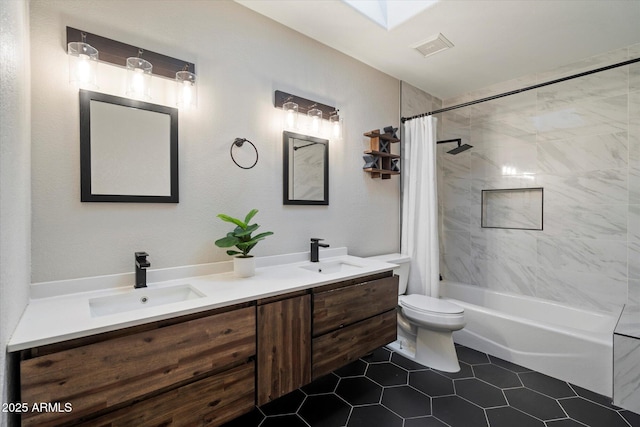 bathroom featuring toilet, shower / bath combination with curtain, double vanity, and tile patterned floors